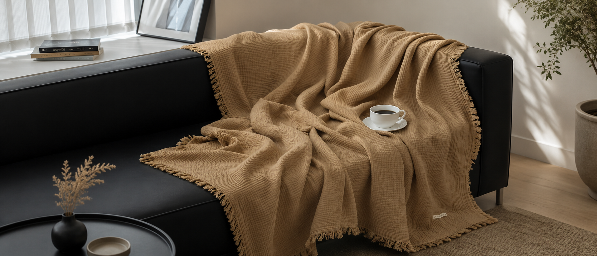 Soft cushions and throws styled in a relaxed living room